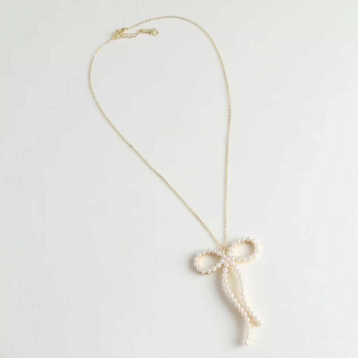 Tessa Pearl Gold Bow Necklace - Le Forge
